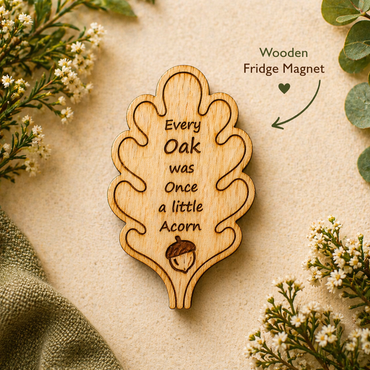 Oak Leaf Magnet wooden fridge magnet with engraved acorn quote on natural background.